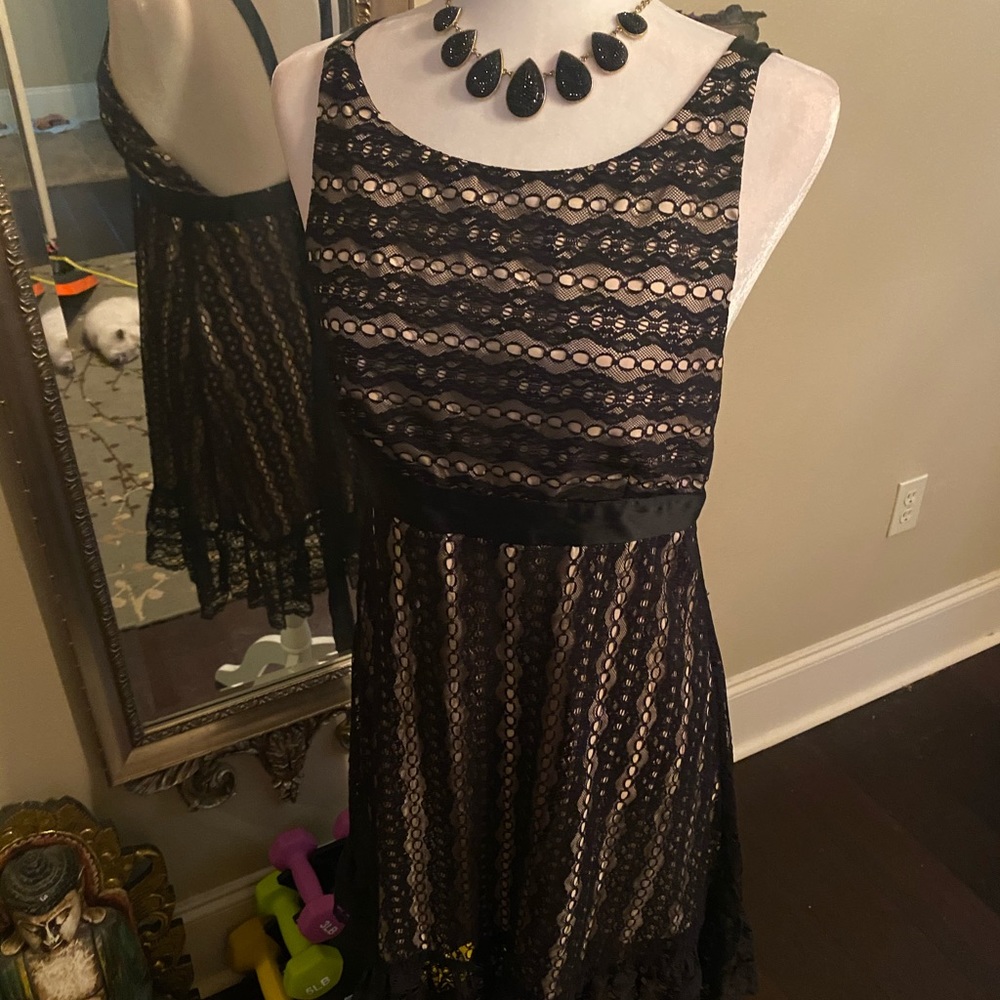 Creamy nude dress with black lace overlay